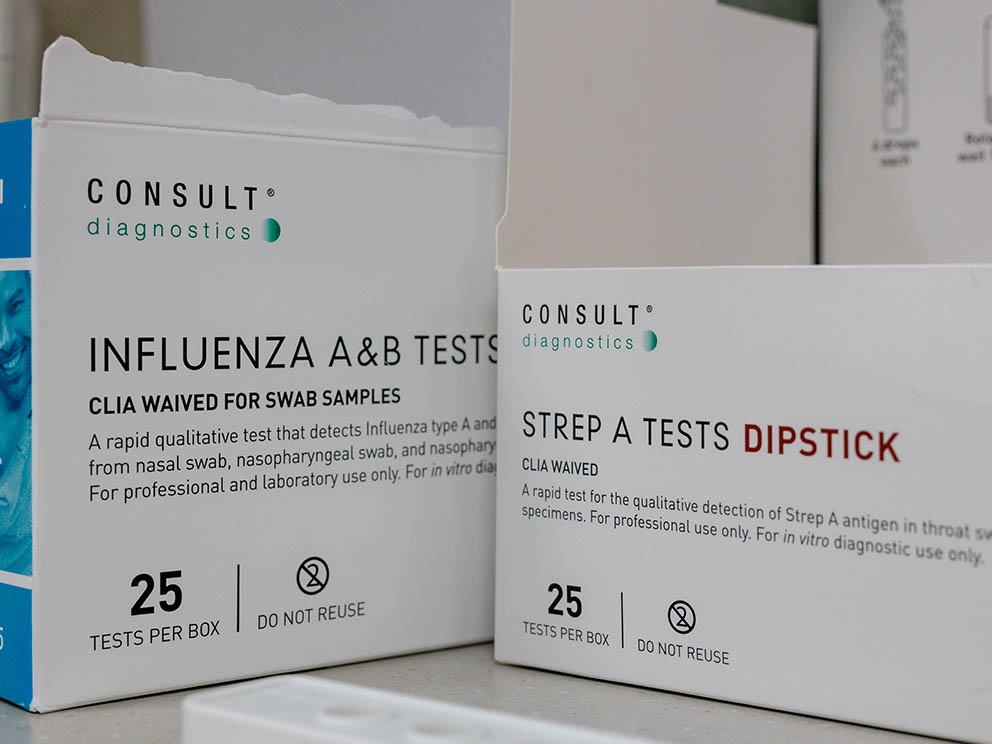Photo of influenza and strep test kits.